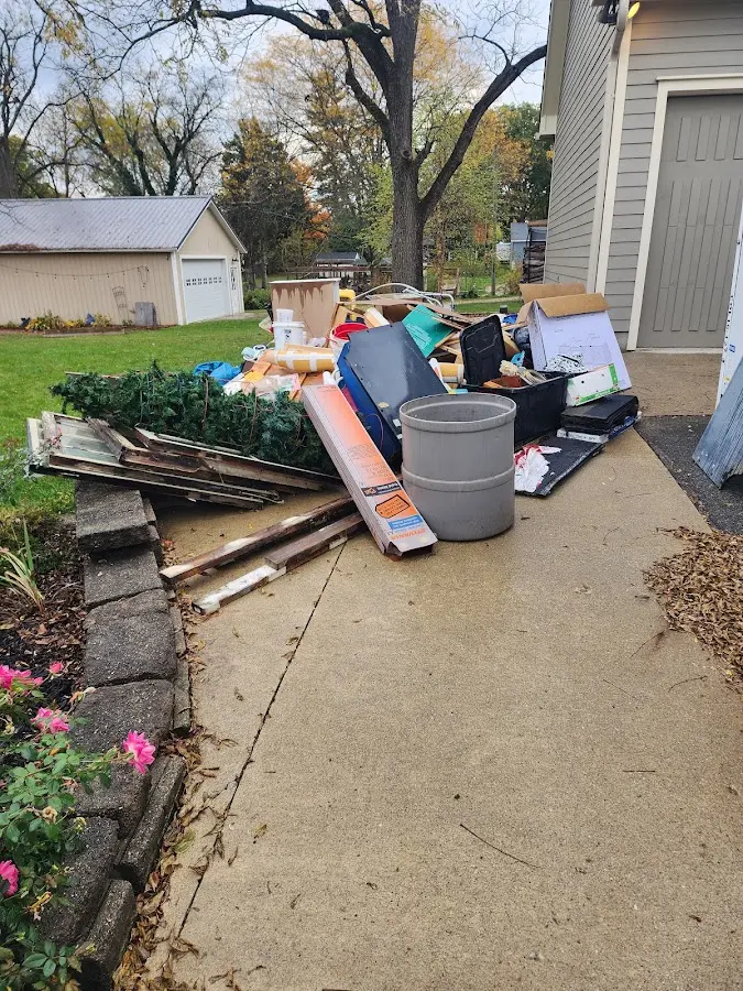 Dumpster being loaded with debris for 30 Yard Dumpster Rental in Church Hill
